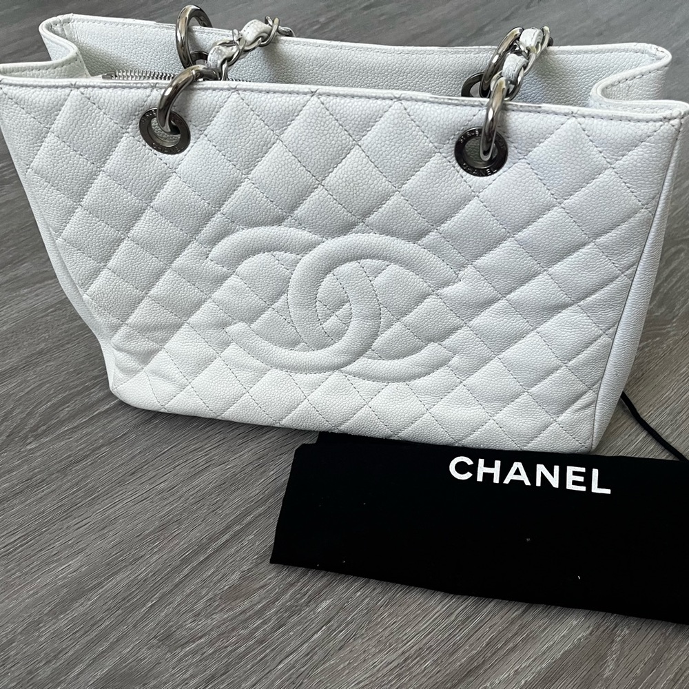 This is iconic Chanel tote. Loving condition